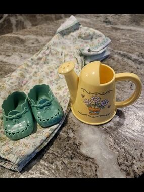 The Gardening Set is a Bitty Baby outfit released in 1996 and later retired.